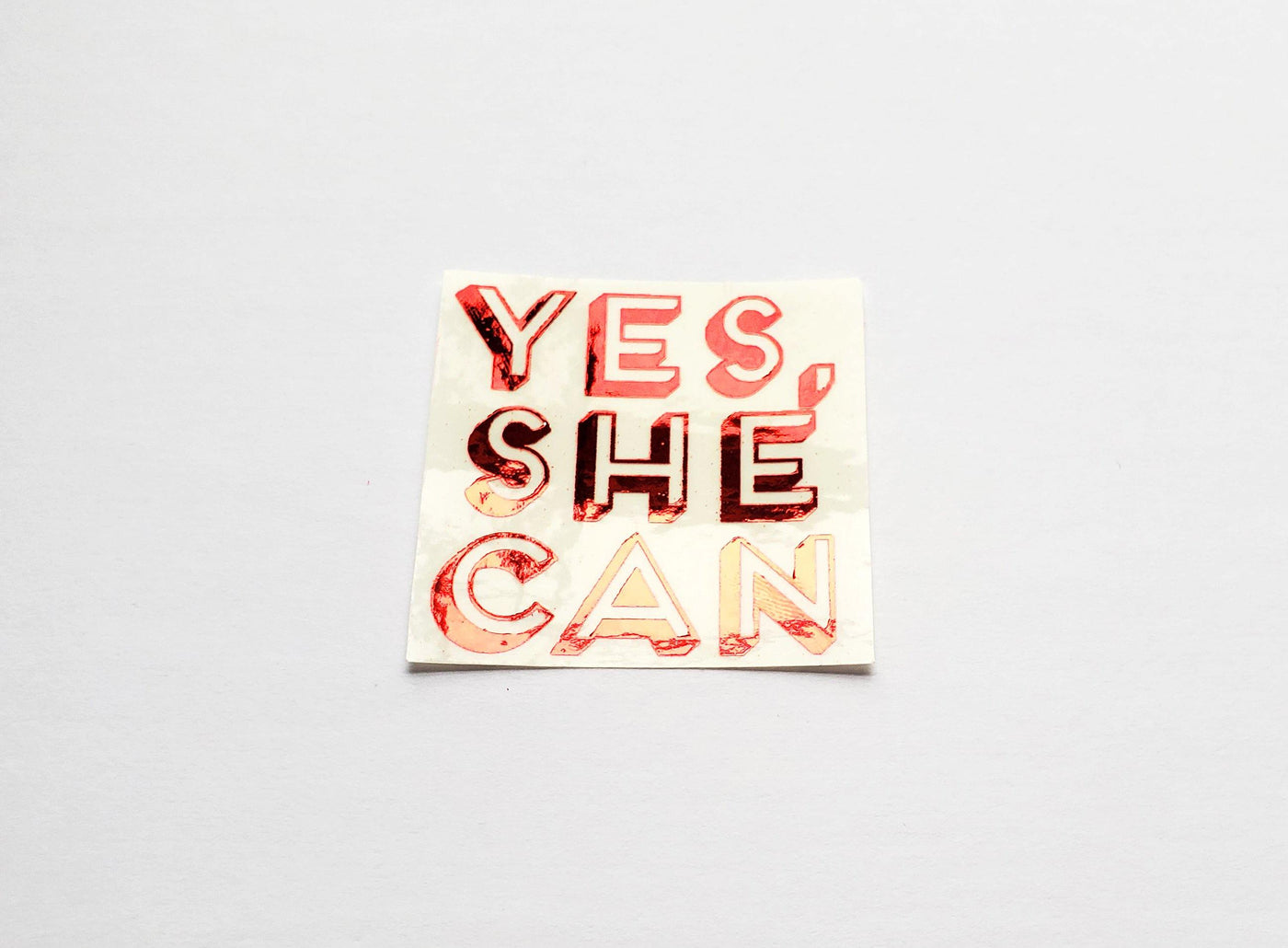 Photo of the Yes, She Can Foiled Sticker in Red by Lucky Dog Design Co.