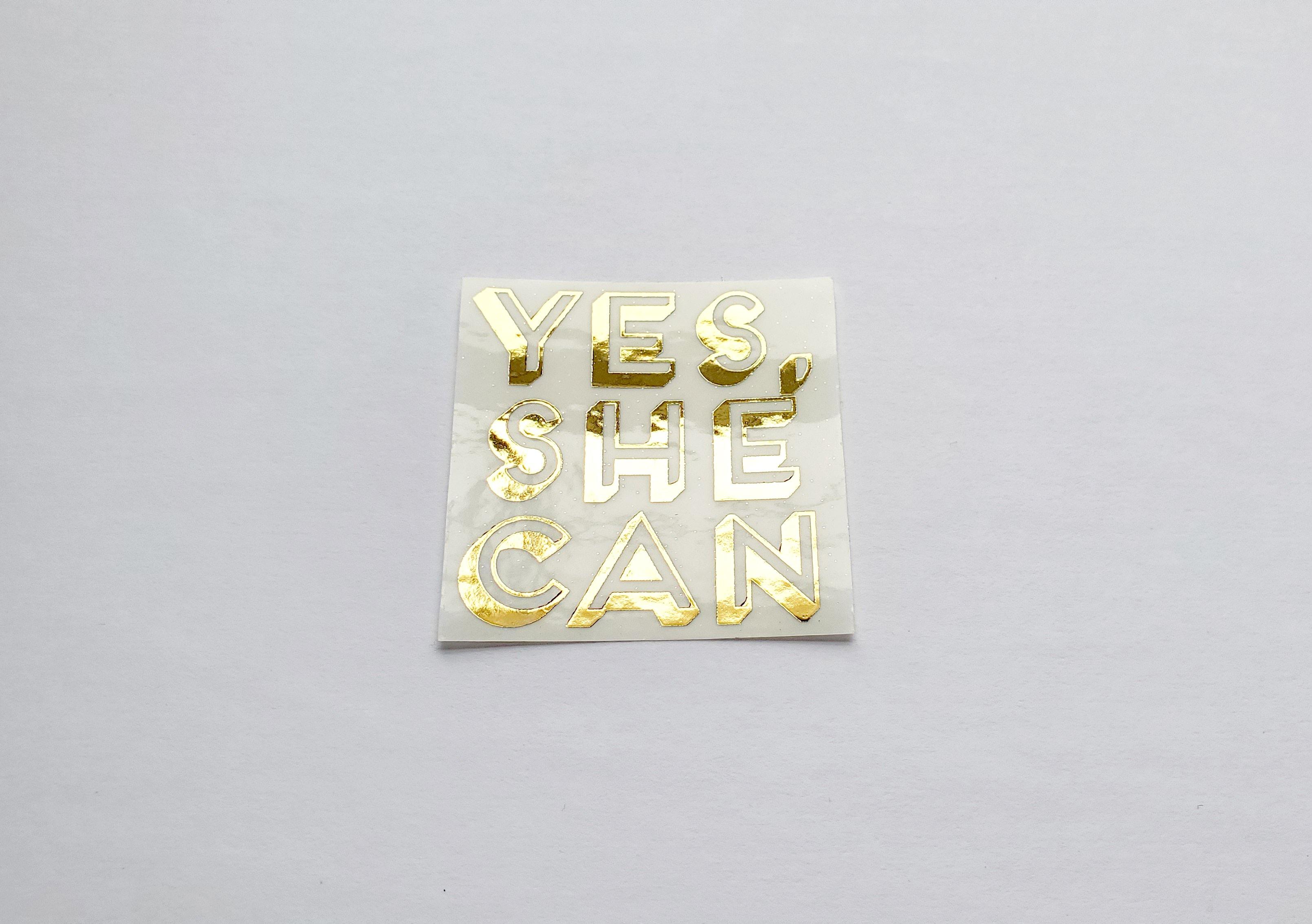 Photo of the Yes, She Can Foiled Sticker in Green Watercolor by Lucky Dog Design Co.