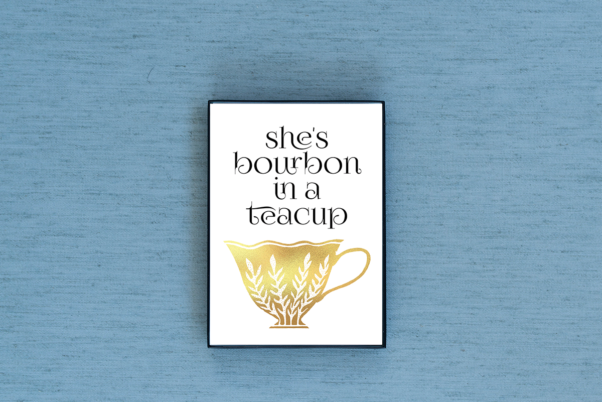 Photo of the She's Bourbon in a Teacup Foiled & Framed Print in Rose Gold by Lucky Dog Design Co.