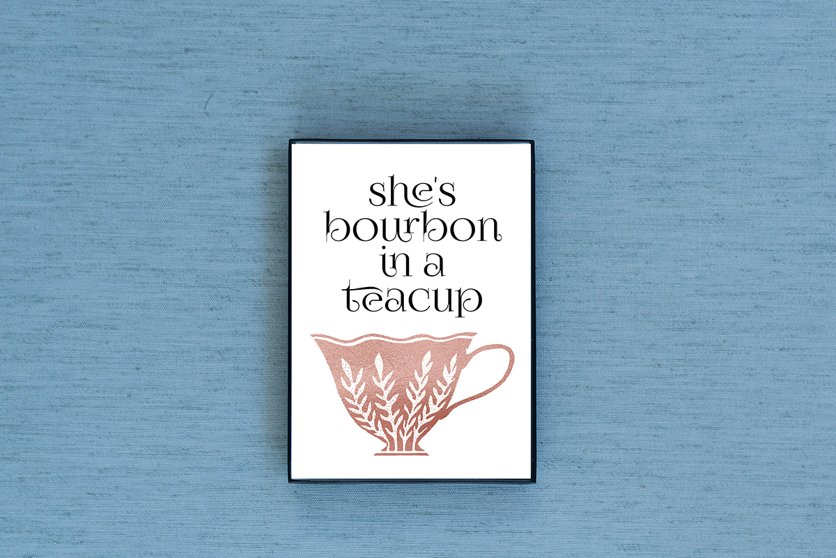 Photo of the She's Bourbon in a Teacup Foiled & Framed Print in Green by Lucky Dog Design Co.