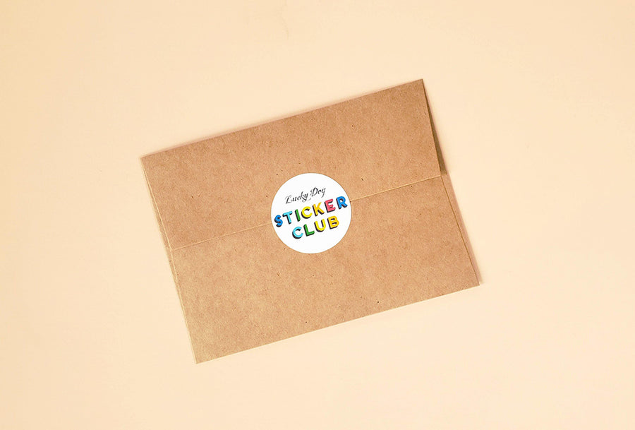 Photo layout of the Lucky Dog Sticker Club envelope