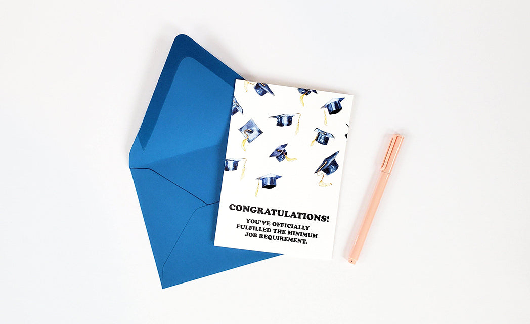Photo of the Minimum Job Requirement Funny Graduation Card by Lucky Dog Design Co.