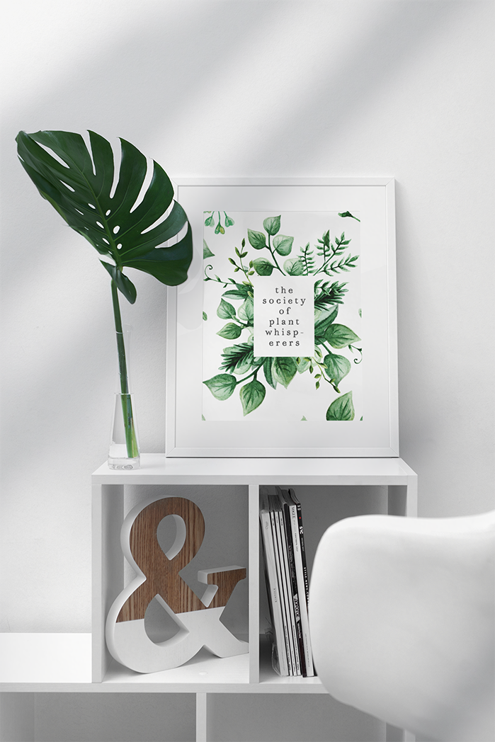 Photo of the The Society of Plant Whisperers Art Print by Lucky Dog Design Co. on display on a wall