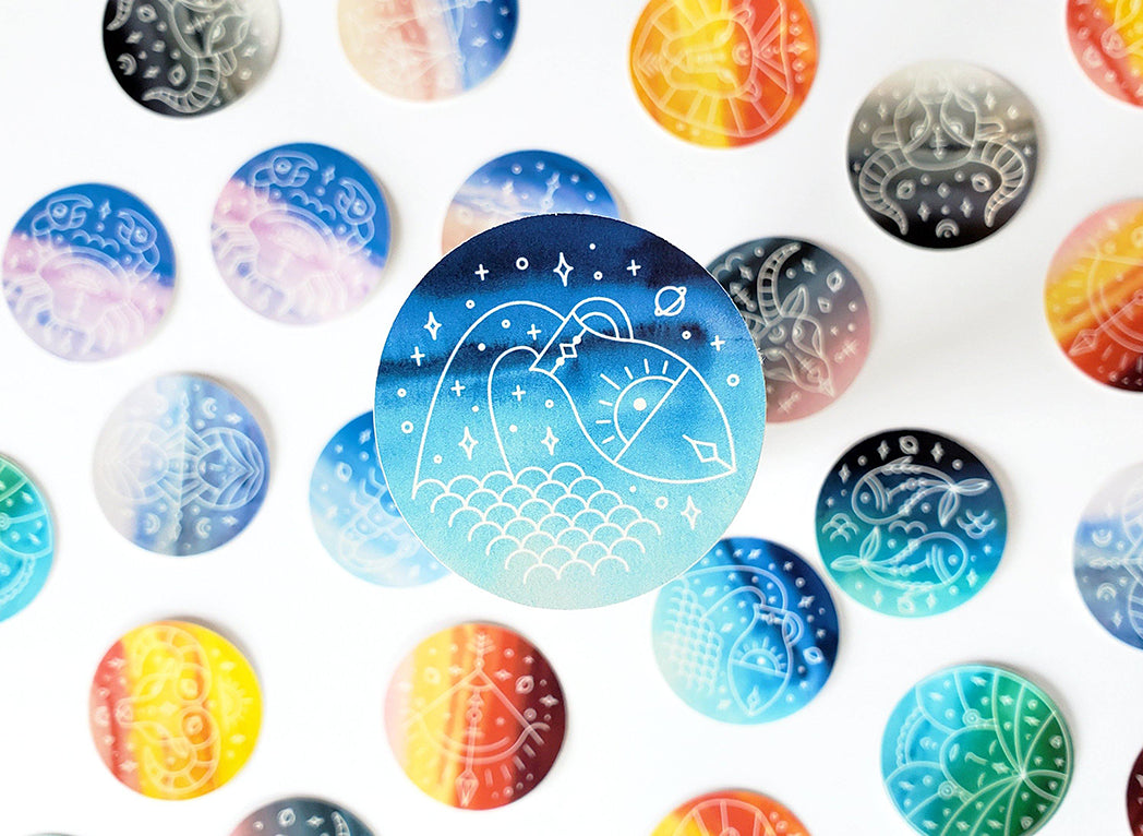 Photo of the Aquarius Watercolor Horoscope Vinyl Sticker by Lucky Dog Design Co.