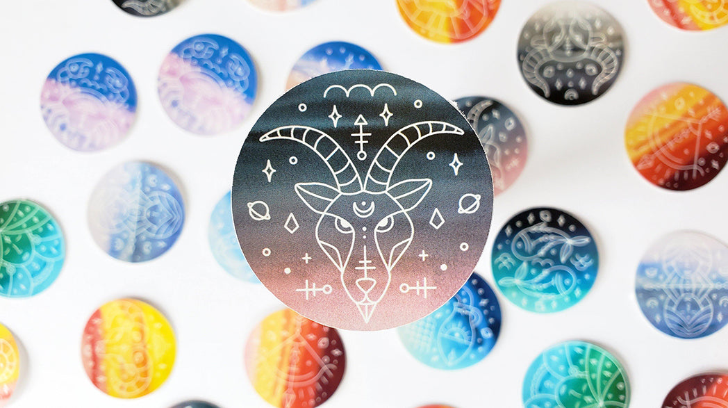 Photo of the Capricorn Watercolor Horoscope Vinyl Sticker by Lucky Dog Design Co.