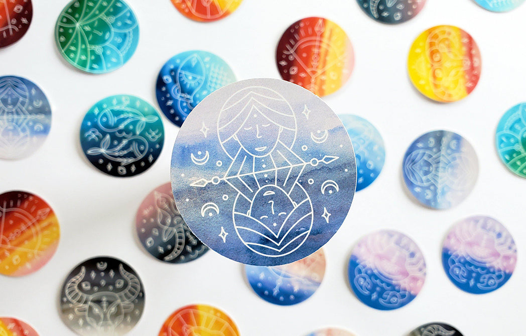 Photo of the Gemini Watercolor Horoscope Vinyl Sticker by Lucky Dog Design Co.