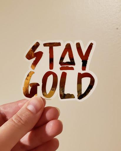 Photo of the Stay Gold Gold Foiled Sticker by Lucky Dog Design Co.